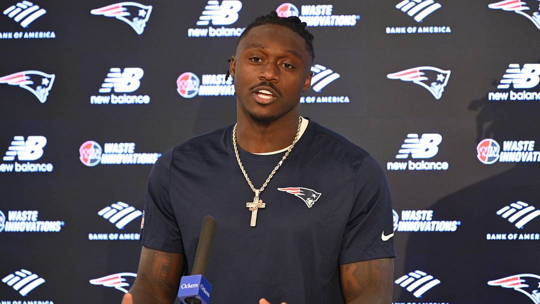 Jun 2, 2026; Foxborough, MA, USA; New England Patriots wide receiver A.J. Brown (1) speaks at a press conference after  practice at the team's OTA at Gillette Stadium. Mandatory Credit: Eric Canha-Imagn Images