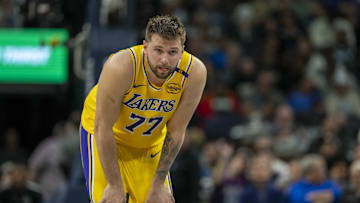 Apr 25, 2025; Minneapolis, Minnesota, USA; Los Angeles Lakers guard Luka Doncic (77) looks on against the Minnesota Timberwolves in the first half during game three of first round for the 2024 NBA Playoffs at Target Center. Mandatory Credit: Jesse Johnson-Imagn Images