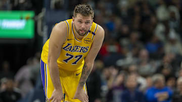 Apr 25, 2025; Minneapolis, Minnesota, USA; Los Angeles Lakers guard Luka Doncic (77) looks on against the Minnesota Timberwolves in the first half during game three of first round for the 2024 NBA Playoffs at Target Center. Mandatory Credit: Jesse Johnson-Imagn Images