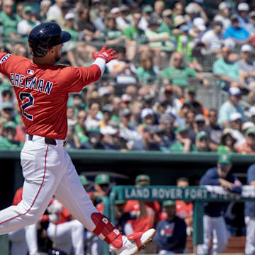 Mar 17, 2025; Fort Myers, Florida, USA; Boston Red Sox Alex Bregman (2) connects with the ball in the first inning against the Baltimore Orioles at JetBlue Park at Fenway South. 