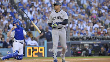 Oct 25, 2024; Los Angeles, California, USA; New York Yankees outfielder Juan Soto (22) reacts after a walk in the first inning against the Los Angeles Dodgers during game one of the 2024 MLB World Series at Dodger Stadium. Mandatory Credit: Jayne Kamin-Oncea-Imagn Images