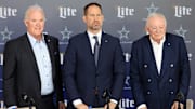 Dallas Cowboys CEO Stephen Jones, head coach Brian Schottenheimer and owner Jerry Jones pose for pictures after a press conference at the Star.  