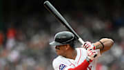 May 25, 2025; Boston, Massachusetts, USA; Boston Red Sox designated hitter Rafael Devers (11) bats against the Baltimore Orioles during the first inning at Fenway Park. Mandatory Credit: Brian Fluharty-Imagn Images