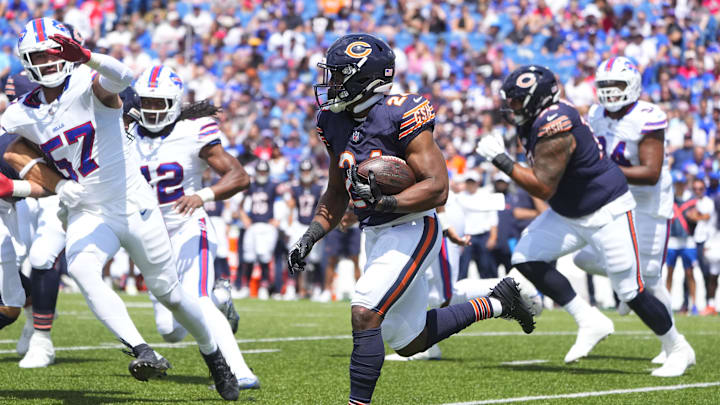 Aug 10, 2024; Orchard Park, New York, USA; Chicago Bears running back Khalil Herbert (24) runs with the ball against the Buffalo Bills during the first half at Highmark Stadium. Mandatory Credit: Gregory Fisher-Imagn Images