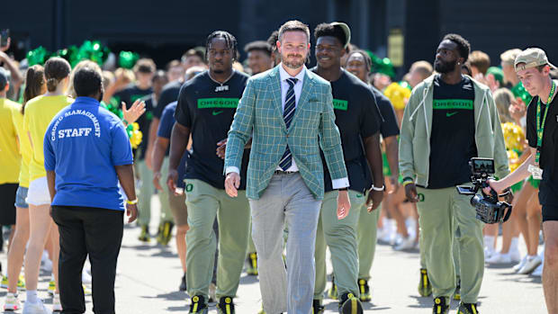 Oregon Ducks head coach Dan Lanning leads the team into the stadium before the game against the Idaho Vandals at Autzen Stadi