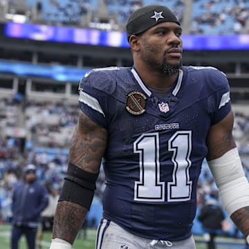 Dec 15, 2024; Charlotte, North Carolina, USA; Dallas Cowboys linebacker Micah Parsons (11) walks onto the field during the first quarter against the Carolina Panthers at Bank of America Stadium. Mandatory Credit: Jim Dedmon-Imagn Images