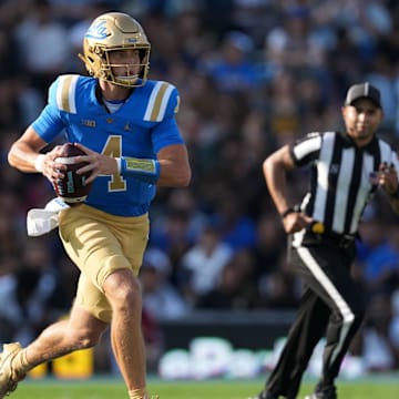 Sep 14, 2024; Pasadena, California, USA; UCLA Bruins quarterback Ethan Garbers (4) throws the ball against the Indiana Hoosiers in the first half at Rose Bowl. Mandatory Credit: Kirby Lee-Imagn Images