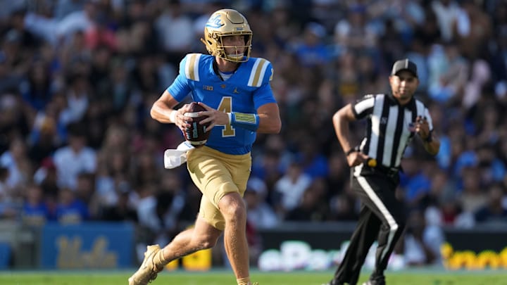 Sep 14, 2024; Pasadena, California, USA; UCLA Bruins quarterback Ethan Garbers (4) throws the ball against the Indiana Hoosiers in the first half at Rose Bowl. Mandatory Credit: Kirby Lee-Imagn Images