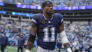 Dallas Cowboys linebacker Micah Parsons (11) walks onto the field during the first quarter against the Carolina Panthers at Bank of America Stadium.