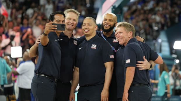 United States assistant coach Erik Spoelstra, head coach Steve Kerr and assistant coach Tyronn Lue