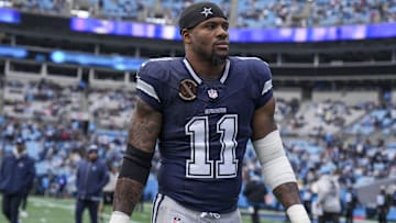 Dallas Cowboys LB Micah Parsons walks onto the field during the first quarter against the Carolina Panthers.