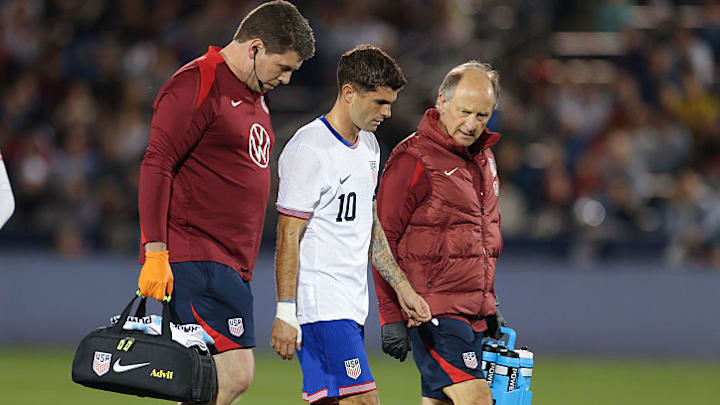 Christian Pulisic (middle) lasted just 26 minutes against Australia.