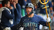 Seattle Mariners first baseman Tyler Locklear (27) celebrates after hitting a home run against the Chicago White Sox during the fifth inning at T-Mobile Park. 