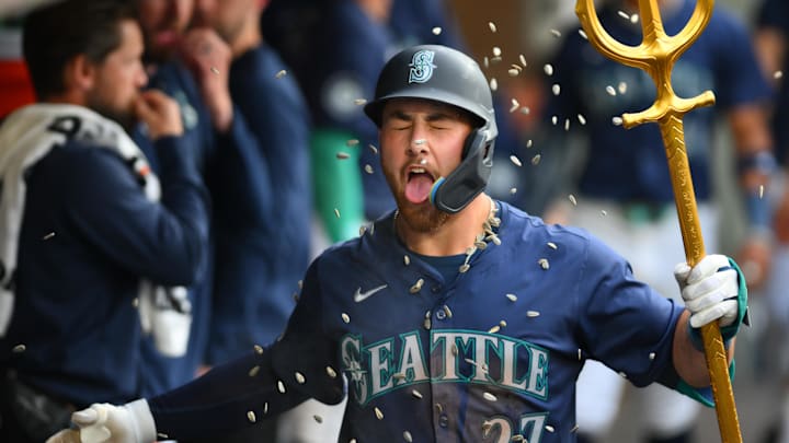 Seattle Mariners first baseman Tyler Locklear (27) celebrates after hitting a home run against the Chicago White Sox during the fifth inning at T-Mobile Park. Seattle Mariners first baseman Tyler Locklear (27) celebrates after hitting a home run against the Chicago White Sox during the fifth inning at T-Mobile Park.