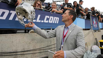 Las Vegas Raiders general manager Dave Ziegler signs autographs before the NFL Hall of Fame game