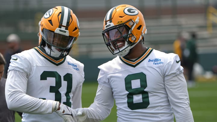 Green Bay Packers running backs Josh Jacobs (8) and Emanuel Wilson at minicamp on Tuesday, June 11, 2024, in Green Bay, Wisconsin.