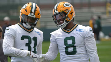 Jun 11, 2024; Green Bay, WI, USA; Green Bay Packers running back Emanuel Wilson (31) and running back Josh Jacobs (8) are shown during the team’s minicamp. Mandatory Credit: Mark Hoffman-USA TODAY Sports