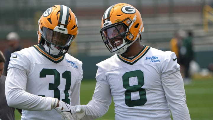 Jun 11, 2024; Green Bay, WI, USA; Green Bay Packers running back Emanuel Wilson (31) and running back Josh Jacobs (8) are shown during the team’s minicamp. Mandatory Credit: Mark Hoffman-USA TODAY Sports