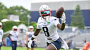 Jun 9, 2025; Foxborough, MA, USA; New England Patriots wide receiver Stefon Diggs (8) tries to catch the ball during minicamp at Gillette Stadium. Mandatory Credit: Eric Canha-Imagn Images