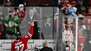 Apr 12, 2025; Chicago, Illinois, USA;  Chicago Blackhawks left wing Patrick Maroon (77) gives his stick to a fan after the game against the Winnipeg Jets at United Center. He retired from the team. Mandatory Credit: Matt Marton-Imagn Images