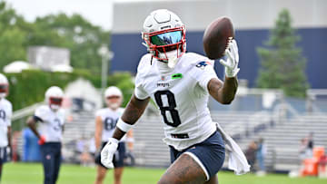 New England Patriots wide receiver Stefon Diggs tries to catch the ball during minicamp at Gillette Stadium.