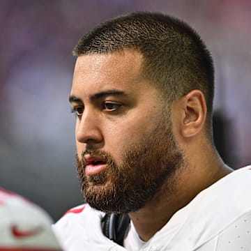 Sep 15, 2024; Minneapolis, Minnesota, USA; San Francisco 49ers guard Dominick Puni (77) looks on during the game against the Minnesota Vikings at U.S. Bank Stadium. Mandatory Credit: Jeffrey Becker-Imagn Images