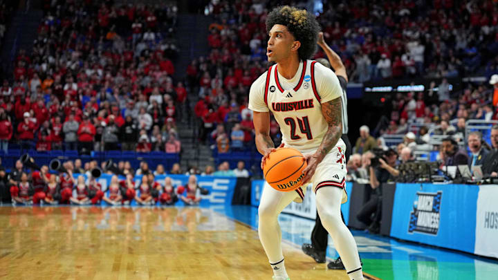 Louisville Cardinals guard Chucky Hepburn (24)