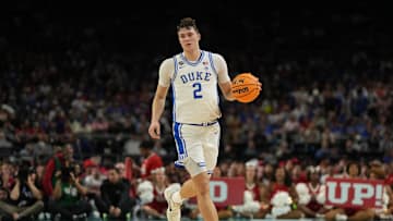 Apr 5, 2025; San Antonio, TX, USA; Duke Blue Devils forward Cooper Flagg (2) dribbles the ball against the Houston Cougars during the second half in the semifinals of the men's Final Four of the 2025 NCAA Tournament at the Alamodome. Mandatory Credit: Bob Donnan-Imagn Images