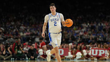 Apr 5, 2025; San Antonio, TX, USA; Duke Blue Devils forward Cooper Flagg (2) dribbles the ball against the Houston Cougars during the second half in the semifinals of the men's Final Four of the 2025 NCAA Tournament at the Alamodome. Mandatory Credit: Bob Donnan-Imagn Images