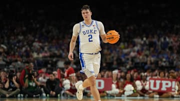 Apr 5, 2025; San Antonio, TX, USA; Duke Blue Devils forward Cooper Flagg (2) dribbles the ball against the Houston Cougars during the second half in the semifinals of the men's Final Four of the 2025 NCAA Tournament at the Alamodome. Mandatory Credit: Bob Donnan-Imagn Images