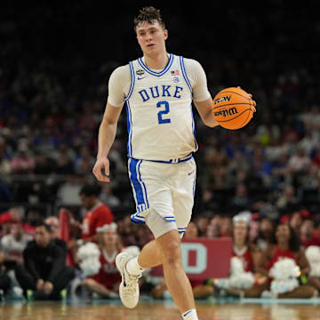 Apr 5, 2025; San Antonio, TX, USA; Duke Blue Devils forward Cooper Flagg (2) dribbles the ball against the Houston Cougars during the second half in the semifinals of the men's Final Four of the 2025 NCAA Tournament at the Alamodome. Mandatory Credit: Bob Donnan-Imagn Images