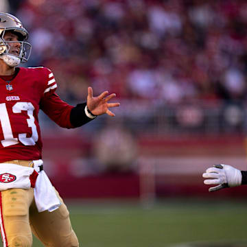 San Francisco 49ers quarterback Brock Purdy (13) throws as Cincinnati Bengals defensive tackle DJ Reader (98) pressures him in the fourth quarter of the NFL game between the Cincinnati Bengals and the San Francisco 49ers at Levi Stadium in Santa Clara, Calif., on Sunday, Oct 29, 2023.