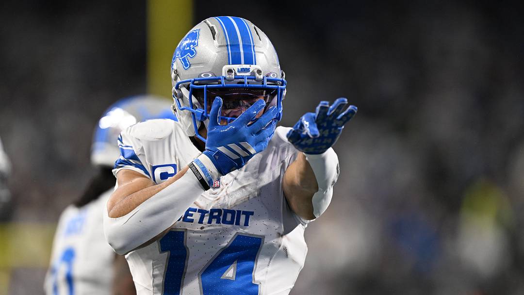 Dec 4, 2025; Detroit, Michigan, USA; Detroit Lions wide receiver Amon-Ra St. Brown (14) celebrates after a play during the first half against the Dallas Cowboys at Ford Field. Mandatory Credit: Lon Horwedel-Imagn Images
