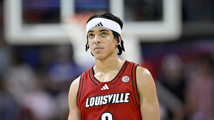 Louisville Cardinals guard Mikel Brown Jr. (0) 