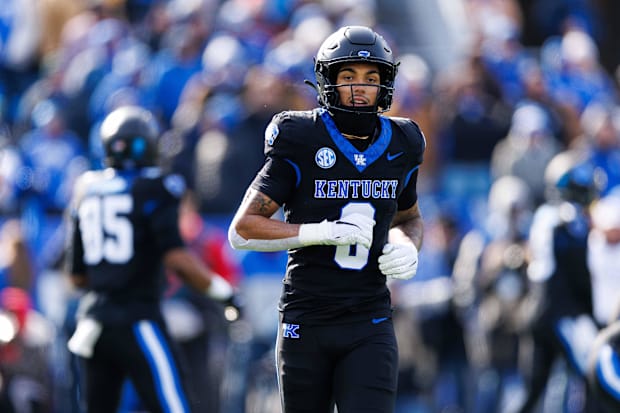 Kentucky Wildcats wide receiver Dane Key (6) runs onto the field during the game against the Louisville Cardinals.