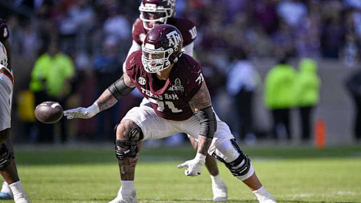 Dec 20, 2025; College Station, TX, USA; Texas A&M Aggies offensive lineman Chase Bisontis (71) blocks the rush during the game between the Aggies and the Hurricanes at Kyle Field. Mandatory Credit: Jerome Miron-Imagn Images