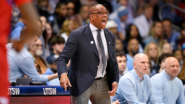 Jan 3, 2026; Dallas, Texas, USA; North Carolina Tar Heels head coach Hubert Davis yells to his team during the first half against the SMU Mustangs at Moody Coliseum. Mandatory Credit: Jerome Miron-Imagn Images