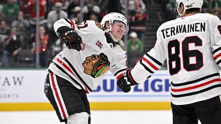 Mar 8, 2026; Dallas, Texas, USA; Chicago Blackhawks center Teuvo Teravainen (86) helps center Oliver Moore (11) after defenseman Sam Rinzel (not pictured) scores a goal against the Dallas Stars during the first period at the American Airlines Center. Mandatory Credit: Jerome Miron-Imagn Images