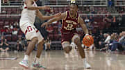 Feb 26, 2025; Stanford, California, USA;  Boston College Eagles guard Donald Hand Jr. (13) drives the ball during the second half against Stanford Cardinal guard Ryan Agarwal (11) at Maples Pavilion. Mandatory Credit: Stan Szeto-Imagn Images