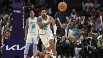 Apr 3, 2024; Charlotte, North Carolina, USA; Charlotte Hornets forward Leaky Black (12) passes the ball up court against the Portland Trail Blazers during the second half at Spectrum Center. Mandatory Credit: Jim Dedmon-USA TODAY Sports