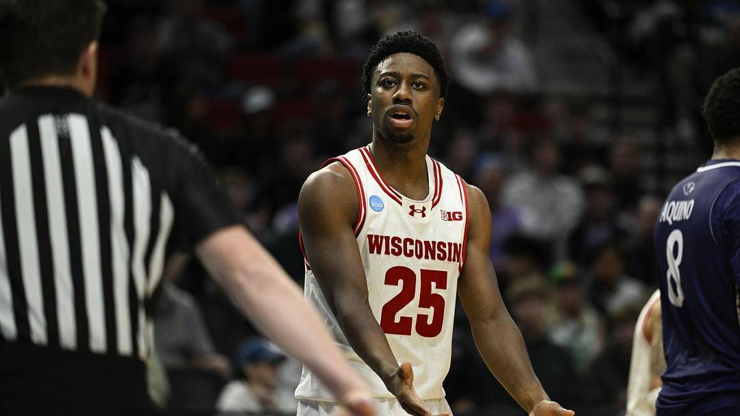 Mar 19, 2026; Portland, OR, USA; Wisconsin Badgers guard John Blackwell (25) reacts during the second half of a first round game of the men's 2026 NCAA Tournament against the High Point Panthers at Moda Center. Mandatory Credit: Troy Wayrynen-Imagn Images