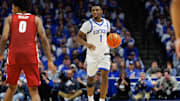 Jan 18, 2025; Lexington, Kentucky, USA; Kentucky Wildcats guard Lamont Butler (1) brings the ball up court during the second half against the Alabama Crimson Tide at Rupp Arena at Central Bank Center. Mandatory Credit: Jordan Prather-Imagn Images