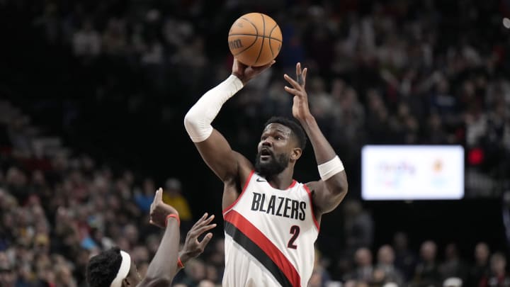 Jan 19, 2024; Portland, Oregon, USA; Portland Trail Blazers center Deandre Ayton (2) shoots the ball over Indiana Pacers power forward Pascal Siam (43) during the second half at Moda Center. Mandatory Credit: Soobum Im-USA TODAY Sports