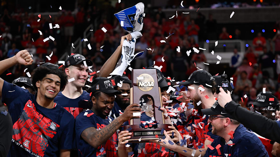 The Arizona Wildcats celebrate after winning the the West Regional final over Purdue to advance to the Final Four. 