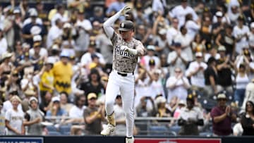 Sep 14, 2025; San Diego, California, USA; San Diego Padres center fielder Jackson Merrill (3) celebrates after hitting a three-run home run during the second inning against the Colorado Rockies at Petco Park. Mandatory Credit: Denis Poroy-Imagn Images