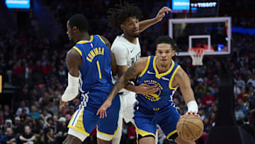 Oct 14, 2025; Portland, Oregon, USA; Golden State Warriors guard Will Richard (3) drives around forward Jonathan Kuminga (1) during the first half against Portland Trail Blazers guard Shaedon Sharpe (17) at Moda Center. Mandatory Credit: Troy Wayrynen-Imagn Images