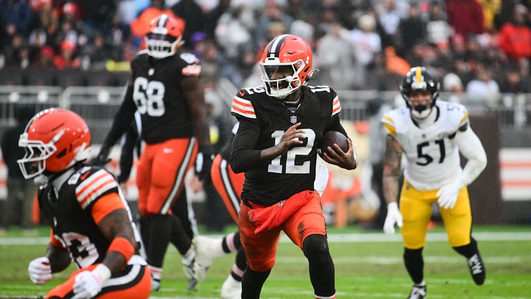 Dec 28, 2025; Cleveland, Ohio, USA; Cleveland Browns quarterback Shedeur Sanders (12) runs with the ball in the second quarter against the Pittsburgh Steelers at Huntington Bank Field. Mandatory Credit: Ken Blaze-Imagn Images