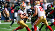Sep 7, 2025; Seattle, Washington, USA; San Francisco 49ers running back Christian McCaffrey (23) runs with the ball during the first half against the Seattle Seahawks at Lumen Field. Mandatory Credit: Steven Bisig-Imagn Images