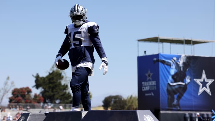 Jul 31, 2024; Oxnard, CA, USA; Dallas Cowboys running back Ezekiel Elliott (15) during training camp at the River Ridge Playing Fields in Oxnard, California.  