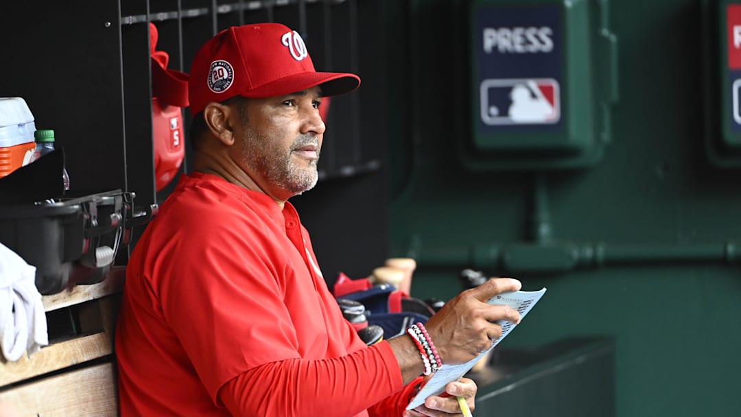 Jun 8, 2025; Washington, District of Columbia, USA; Washington Nationals manager Dave Martinez (4) in the dugout against the Texas Rangers at Nationals Park. 